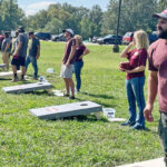 Providence team playing corn hole